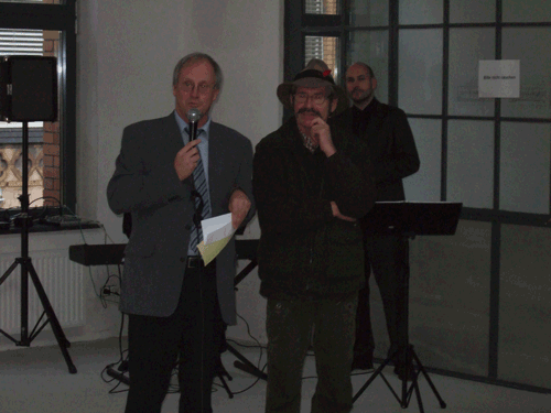 Dieter Ruhnke and Jrgen Draeger; in the background Cem Szer of the ORWOhaus-Duo that cares for the background music